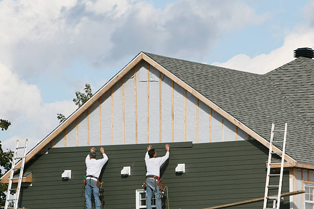 Professional Siding Replacement technician working in Clearville, PA